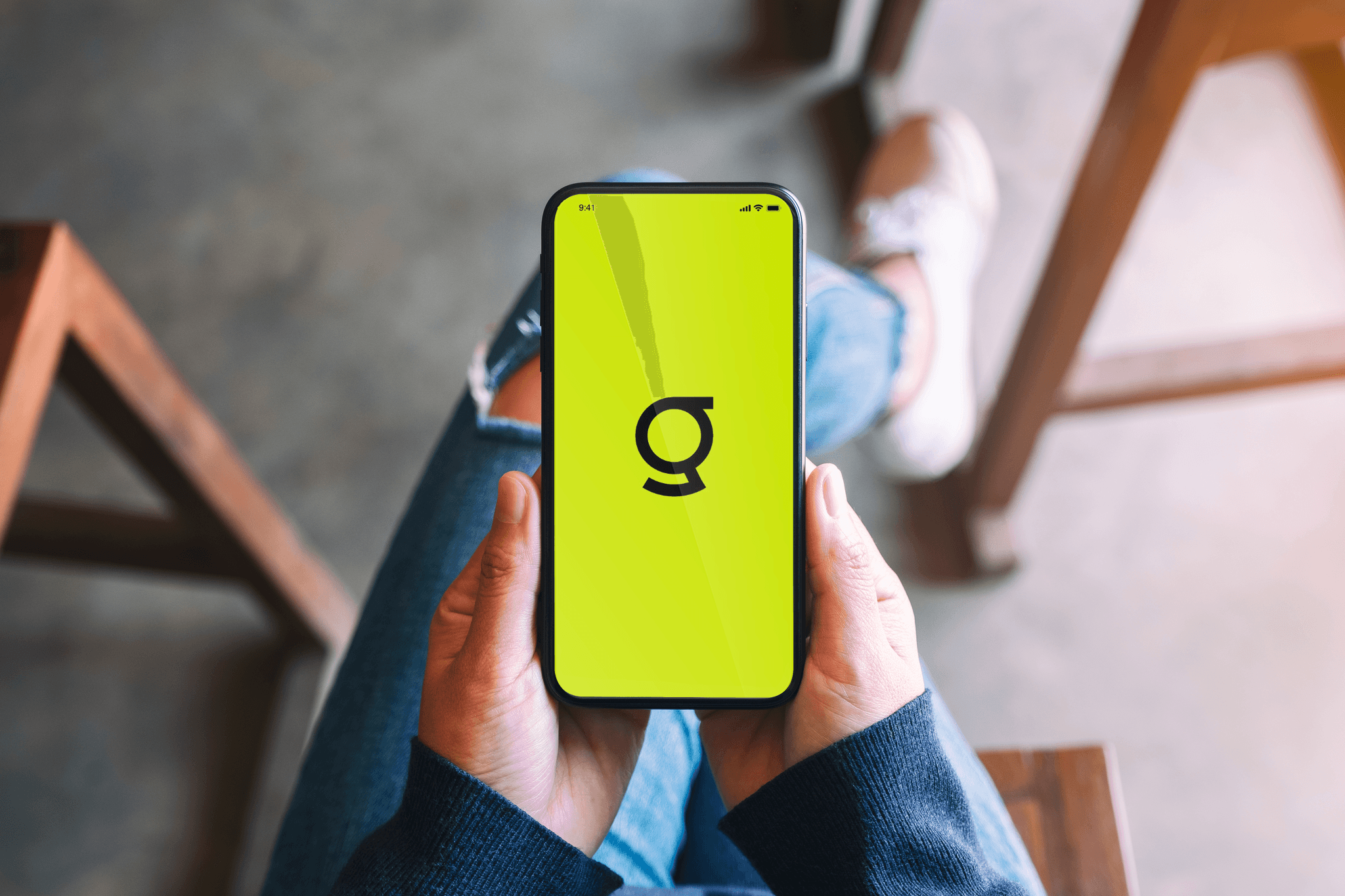 Graphinion app identity shown on a phone